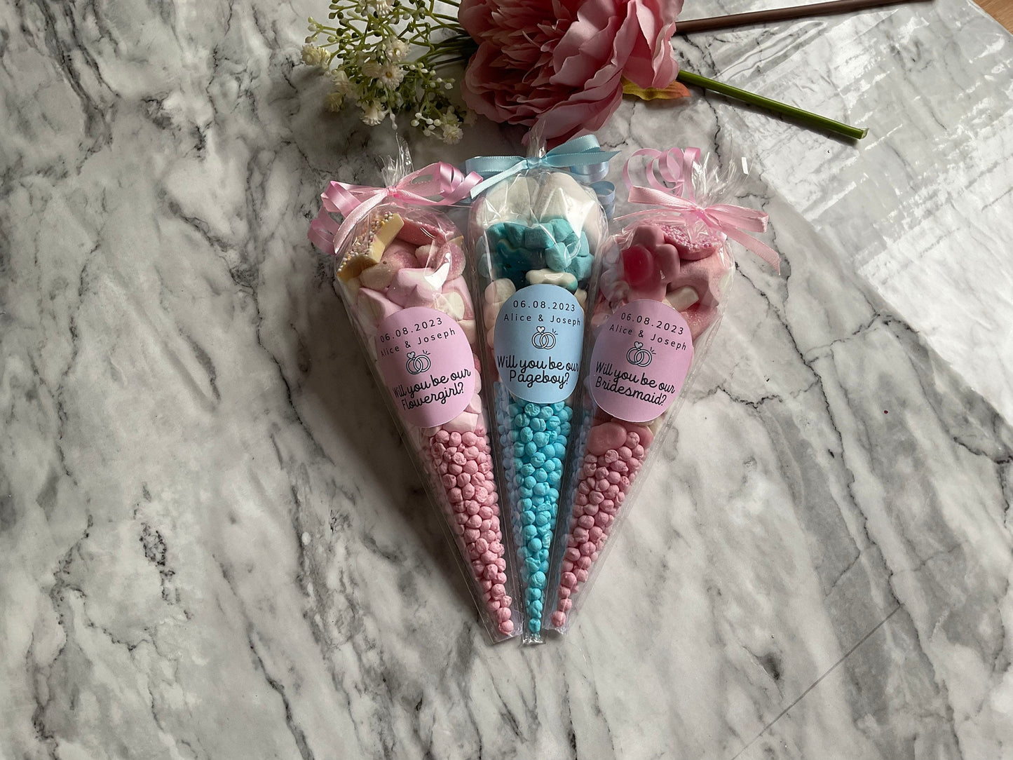 Pink and Blue sweet cones reading Thank you for being our flower girl/pageboy/bridesmaid